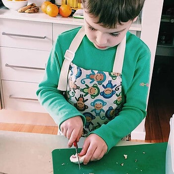 kids cooking in monkey apron