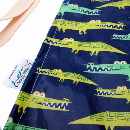 crocodile laminated cotton apron