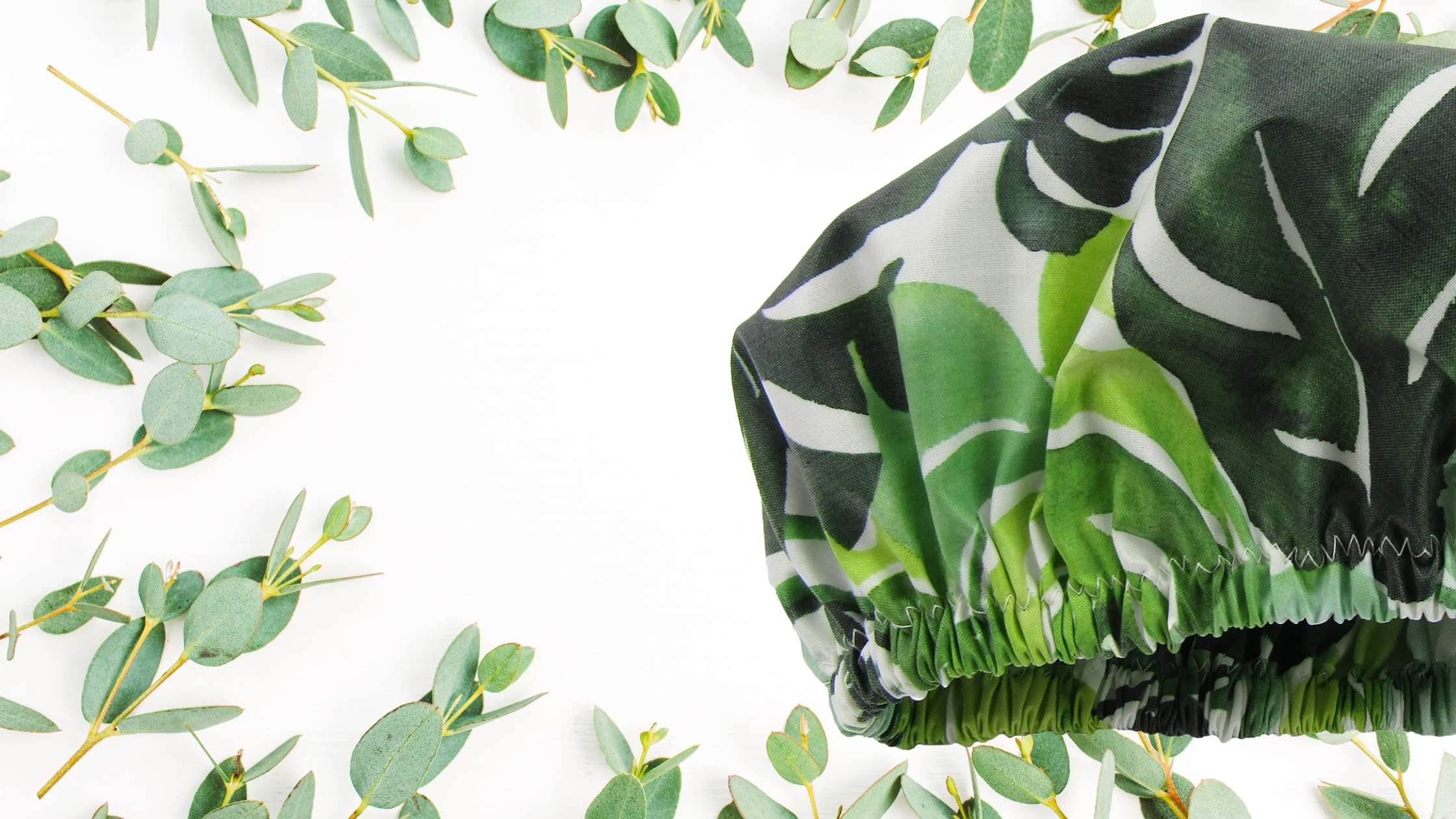 laminated cotton shop monstera leaves shower cap