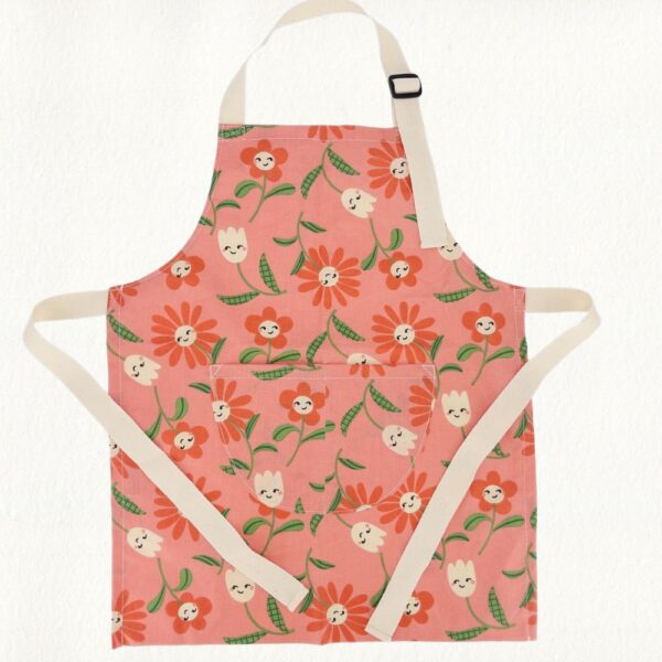 pink flowers kids apron flatlay french coated cotton pink flowers kids waterproof French coated cotton apron