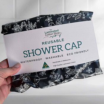 black-white-flowers-laminated-cotton-shower-cap-australian-made-waterproof laminated cotton black and white flowers shower cap made in Australia