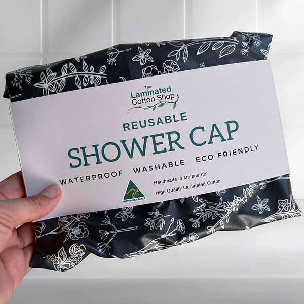 black-white-flowers-laminated-cotton-shower-cap-australian-made-waterproof laminated cotton black and white flowers shower cap made in Australia
